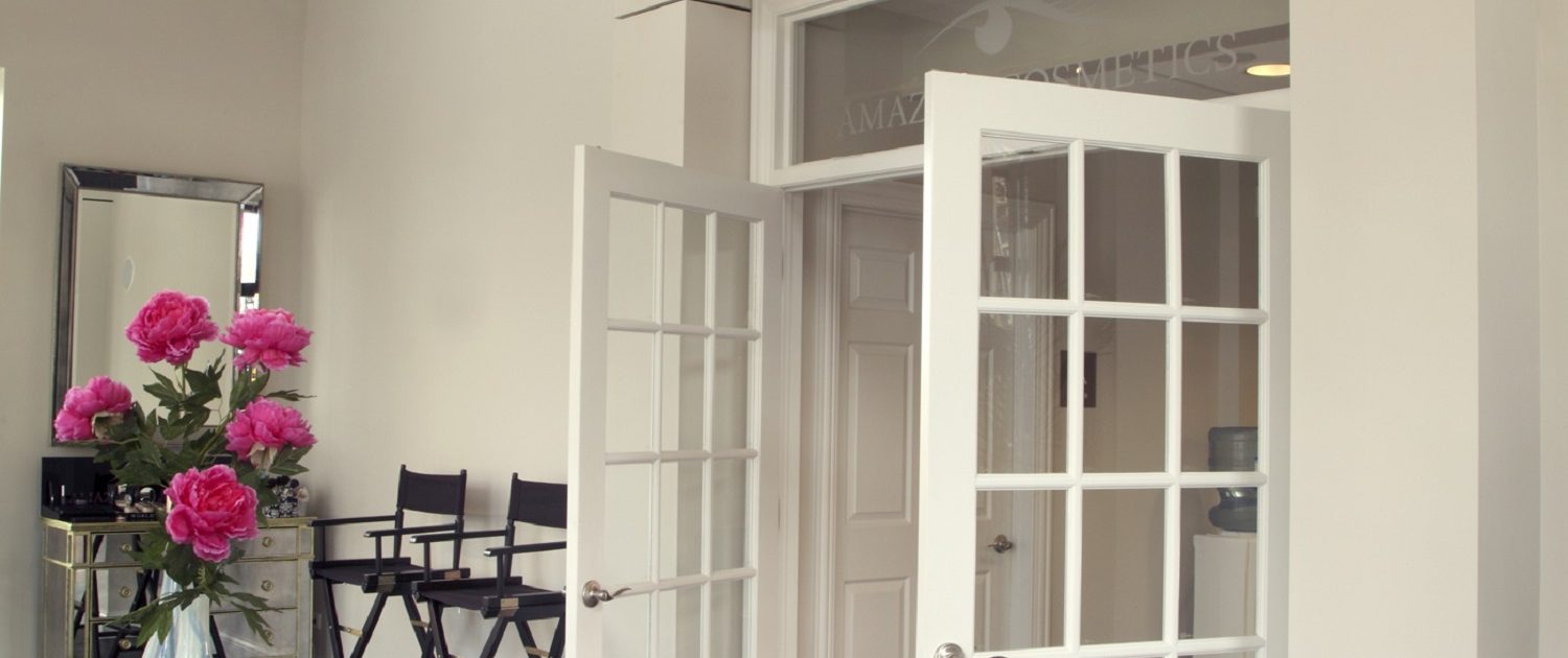 French doors open from the make-up studio to the office space at AmazingCosmetics.