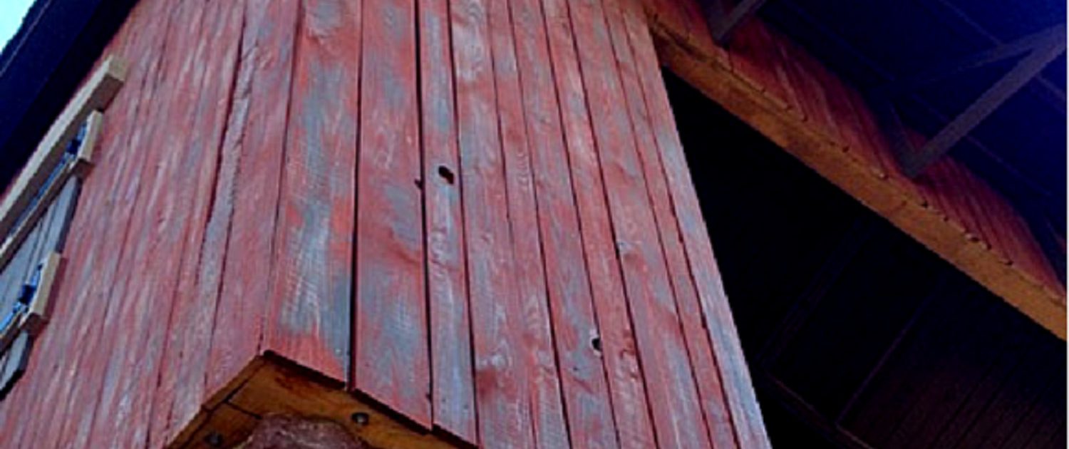 This image is a close up of the materials used to build the launch station, including stonework and hand-weathered barn wood.