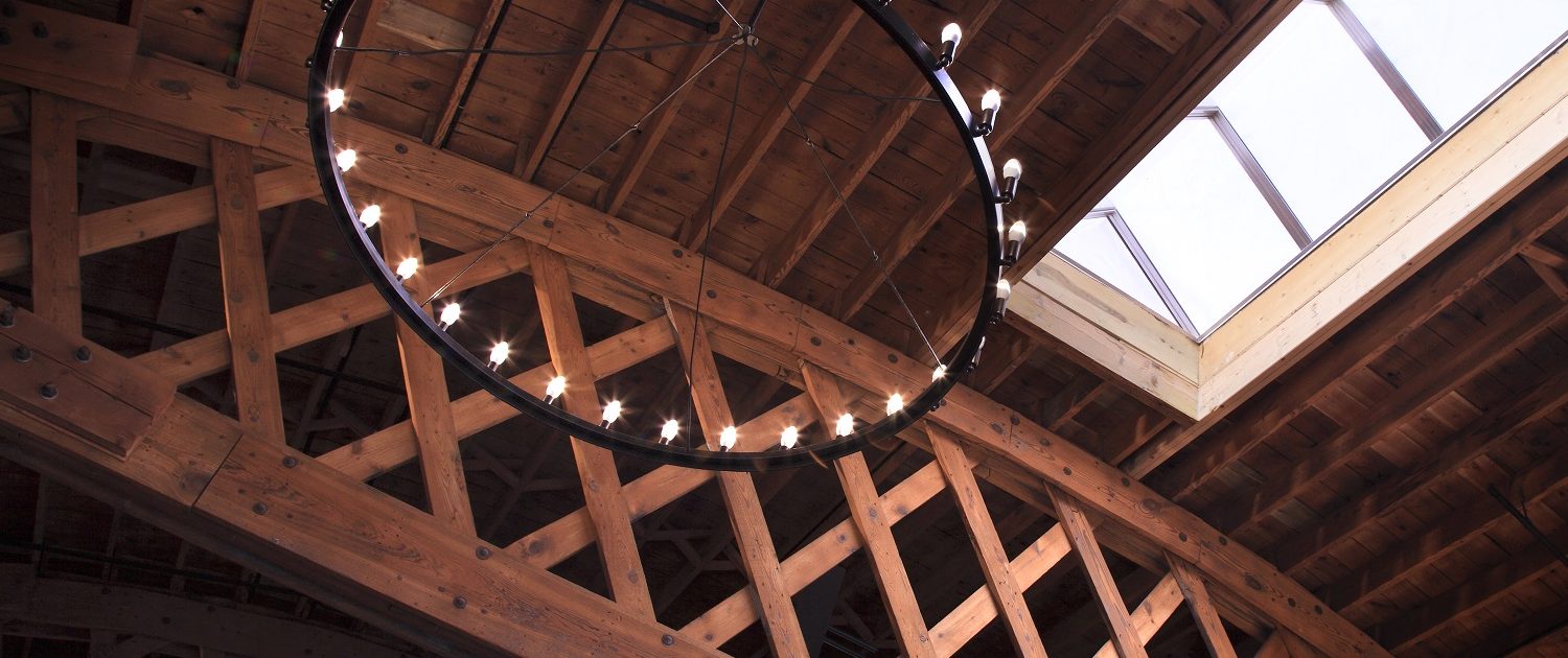Mickey Finn's building interior features a soaring barrel vault ceiling and massive bowstring trusses that have been sandblasted and restored.