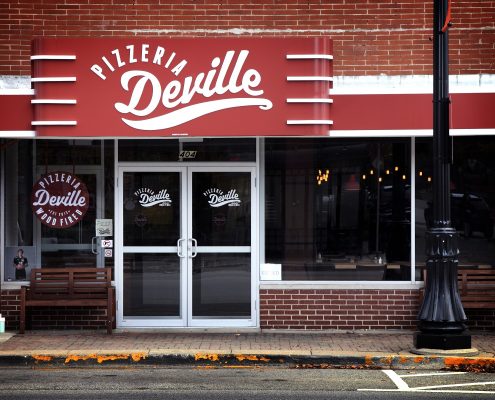 View of the front entrance to Pizzeria DeVille in downtown Libertyville.