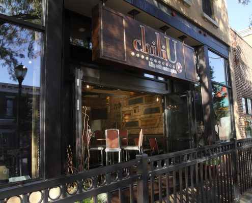 View of Chili U glass retractable entrance facing Milwaukee Avenue in Downtown Libertyville.